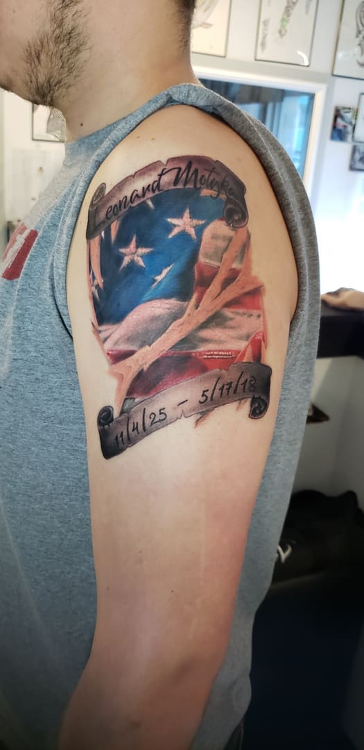A colored tattoo of the American flag