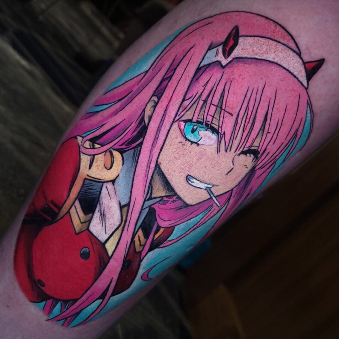 A tattoo of a girl with pink hair and horns on her head.