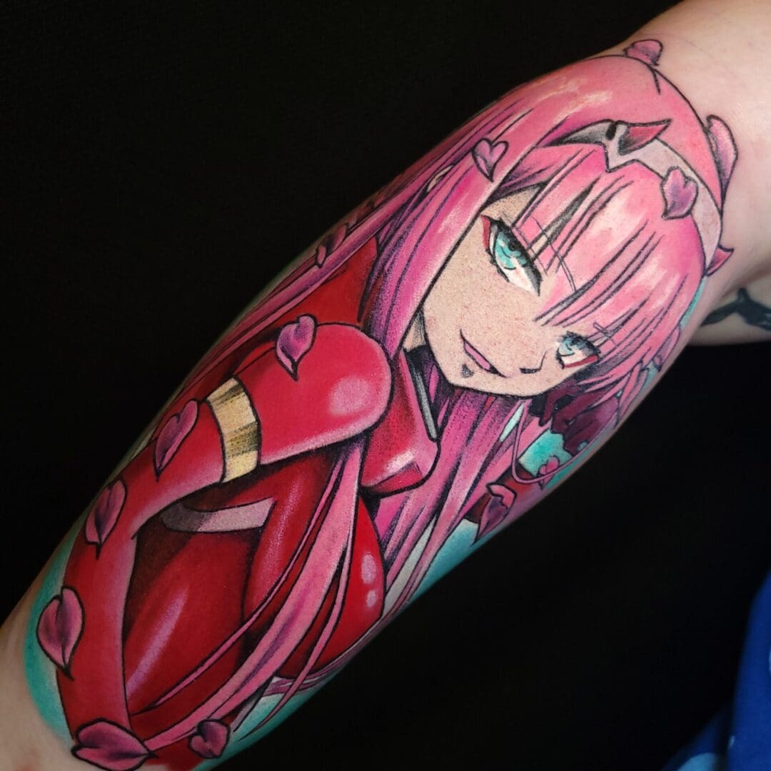 A tattoo of a woman with pink hair and red outfit.
